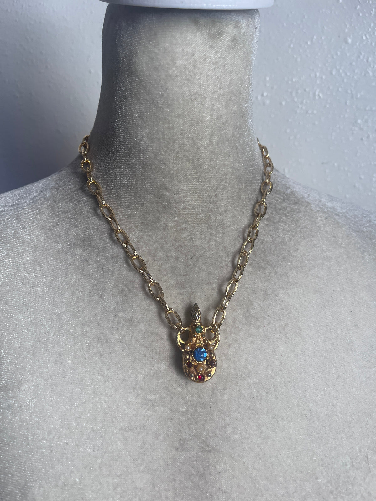 Perfume bottle necklace