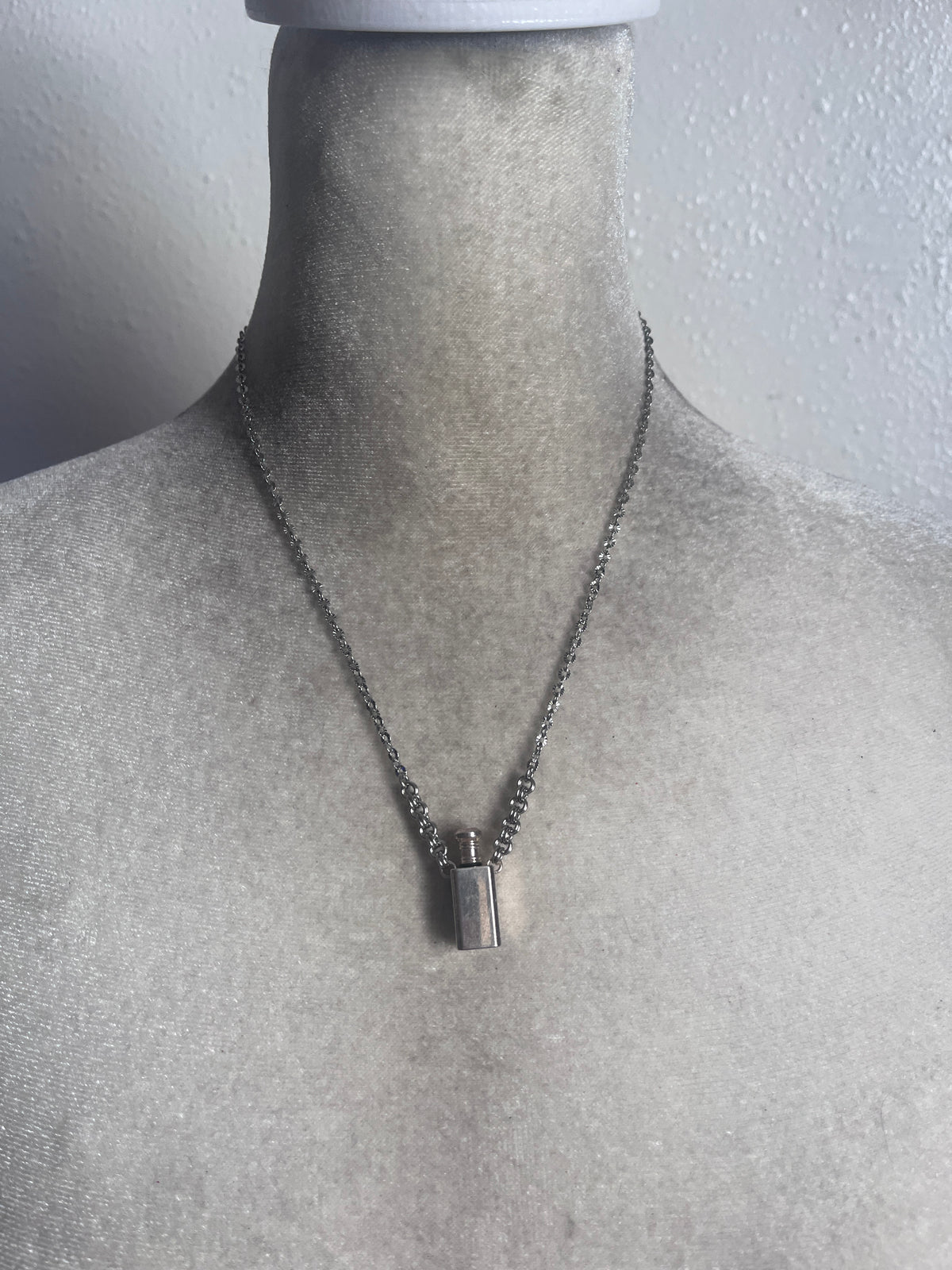 Silver perfume bottle necklace
