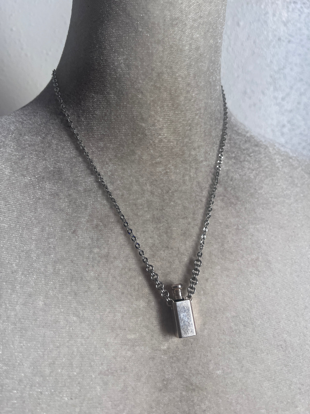 Silver perfume bottle necklace